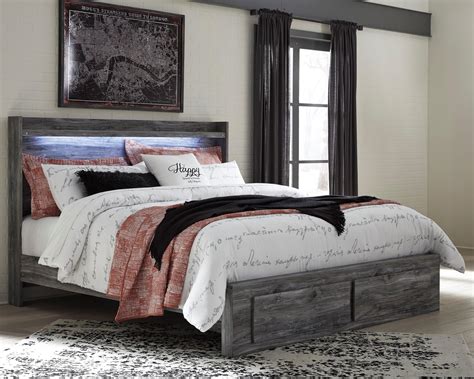 ashley furniture king bed withn slates and metal box spring|Ashley Furniture king size bedroom.